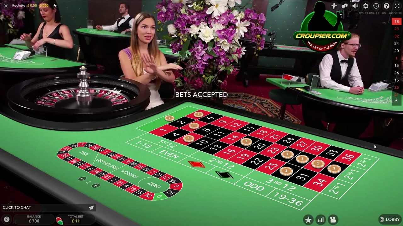 Crupier cerrando las apuestas en una mesa de ruleta en vivo